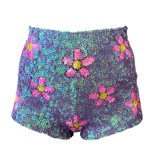 Handmade festival hot pants in vibrant pink and purple with floral sequins. Perfect for festival wear and Taylor Swift concert outfits. Stylish, eye-catching, and comfortable.