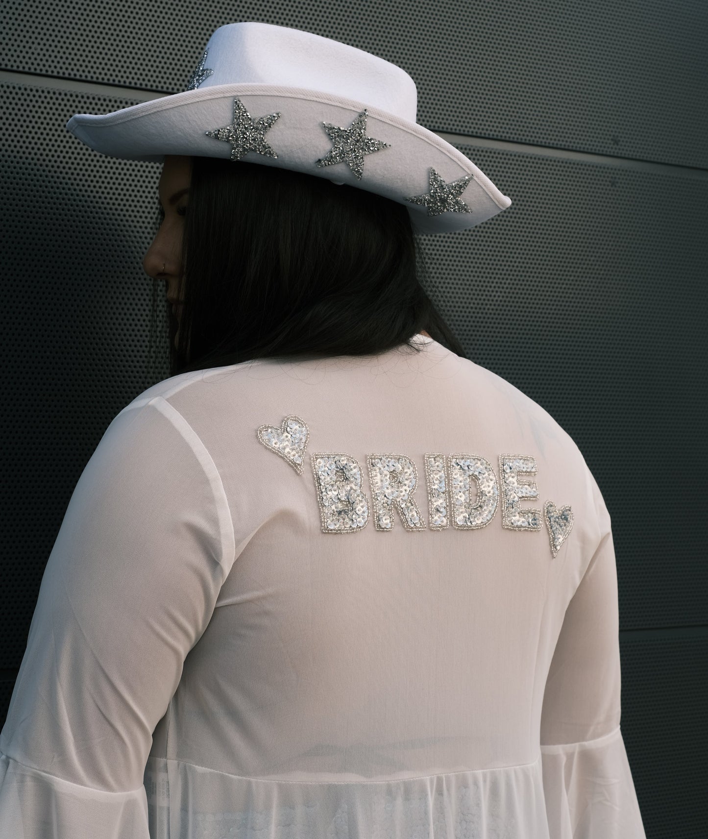 White bridal kimono for hens parties, bridal showers, and bachelorette events. A luxurious and elegant gown for the bride to wear while getting ready on her wedding morning.