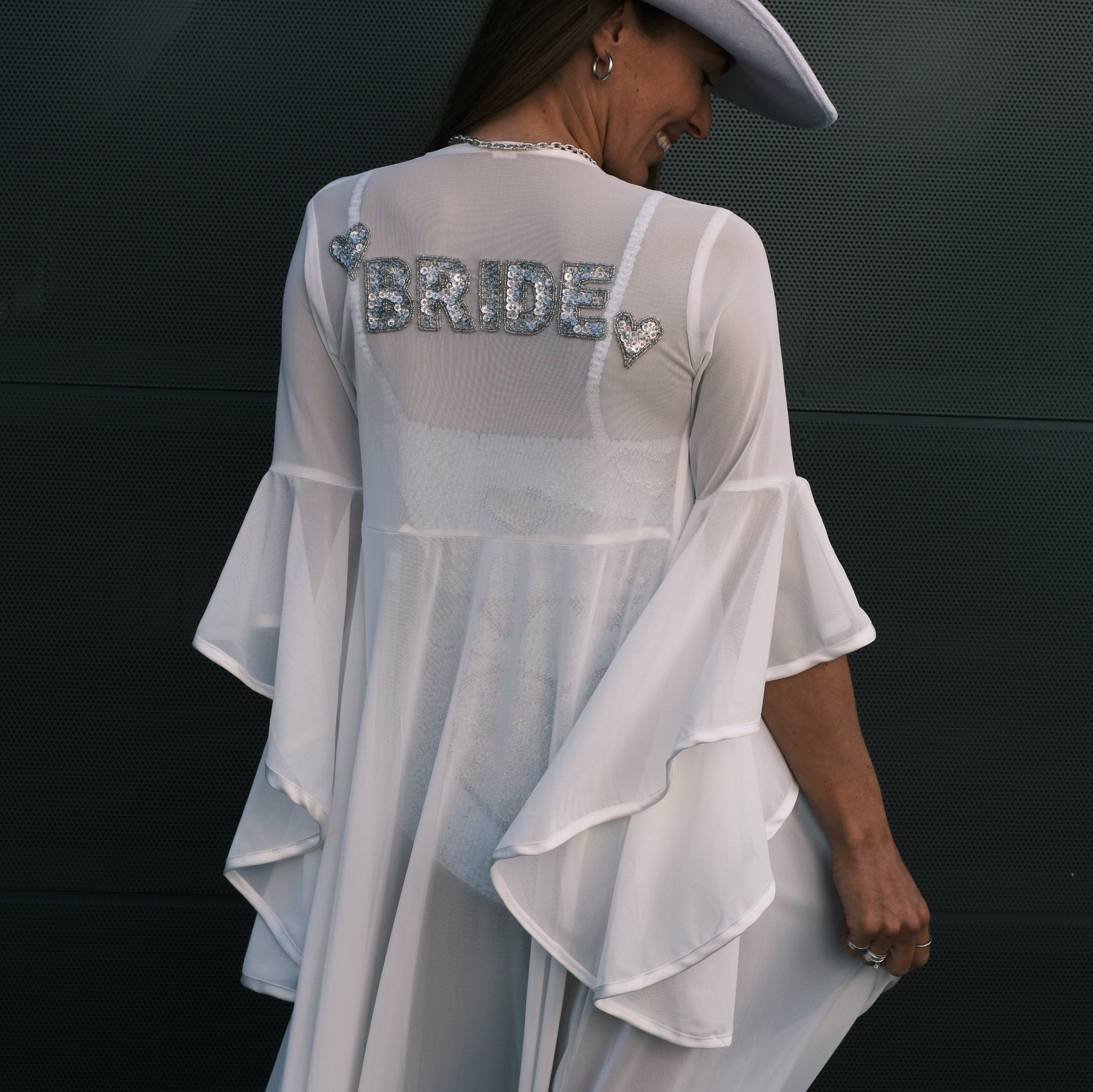 Handmade ivory mesh bridal kimono with hand-beaded 'Bride' in sequins. Ideal for hens parties, bridal showers, bachelorette events, and as a luxurious gown for the bride to wear on her wedding morning
