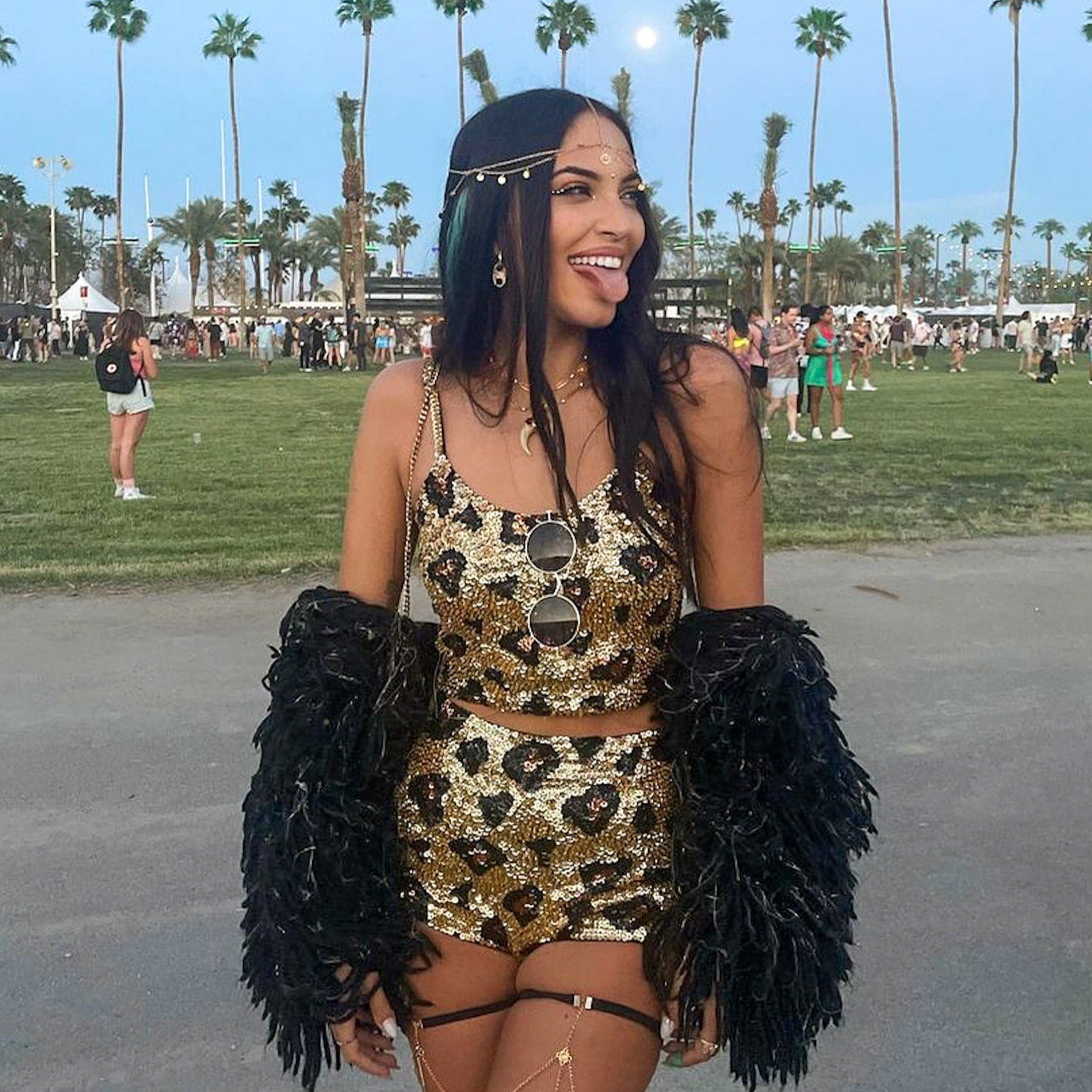 Coachella fashion, festival girl, festival outfit, leopard print, sequins, hot pants, shorts, crop top, palm springs, coachella valley, music festival, rave wear, festival fashion.