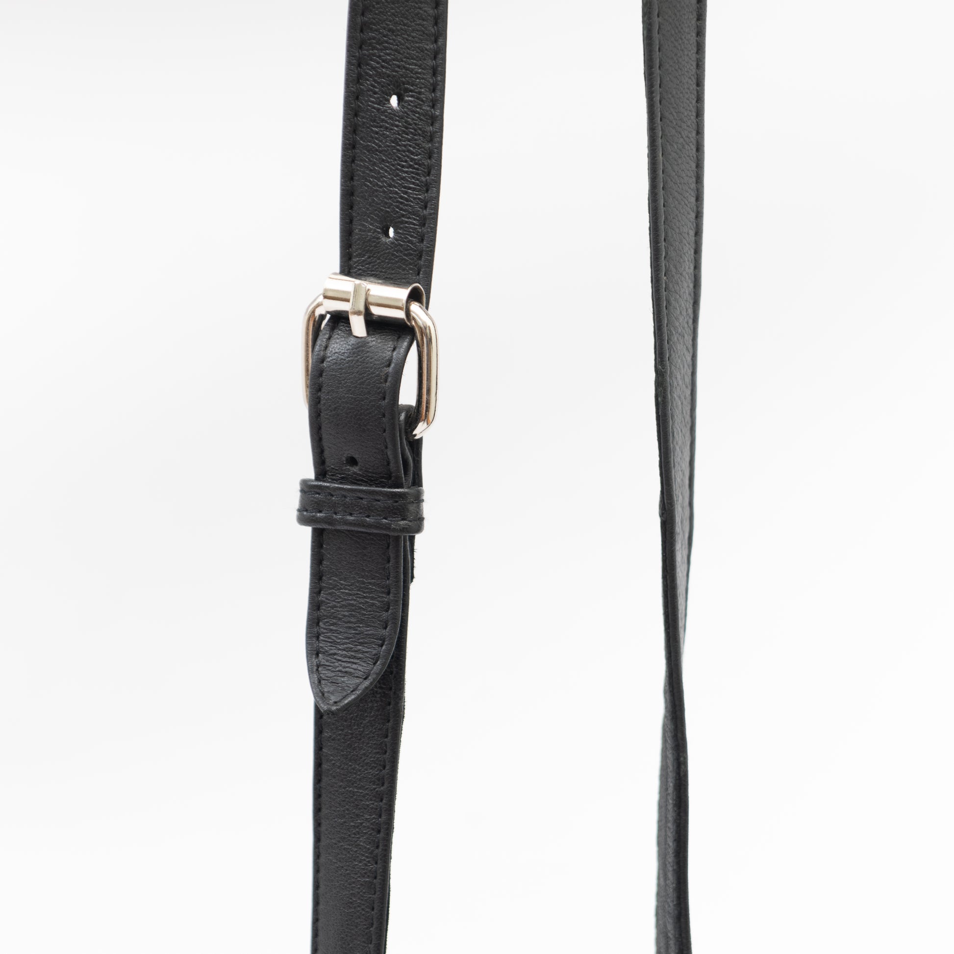 adjustable black leather shoulder strap with silver buckle