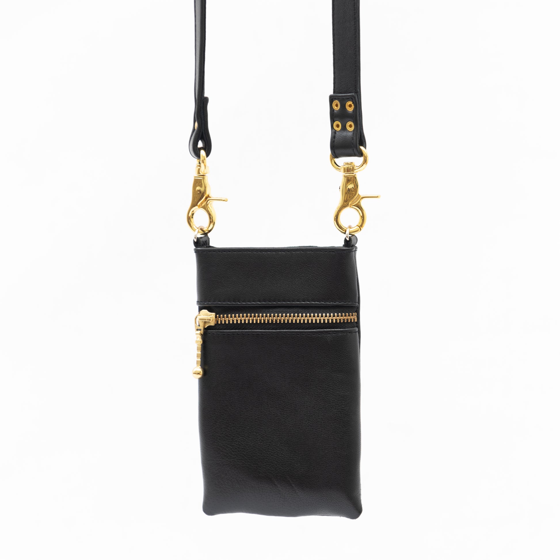 back view of black leather crossbody phone bag with hidden gold zip pocket.