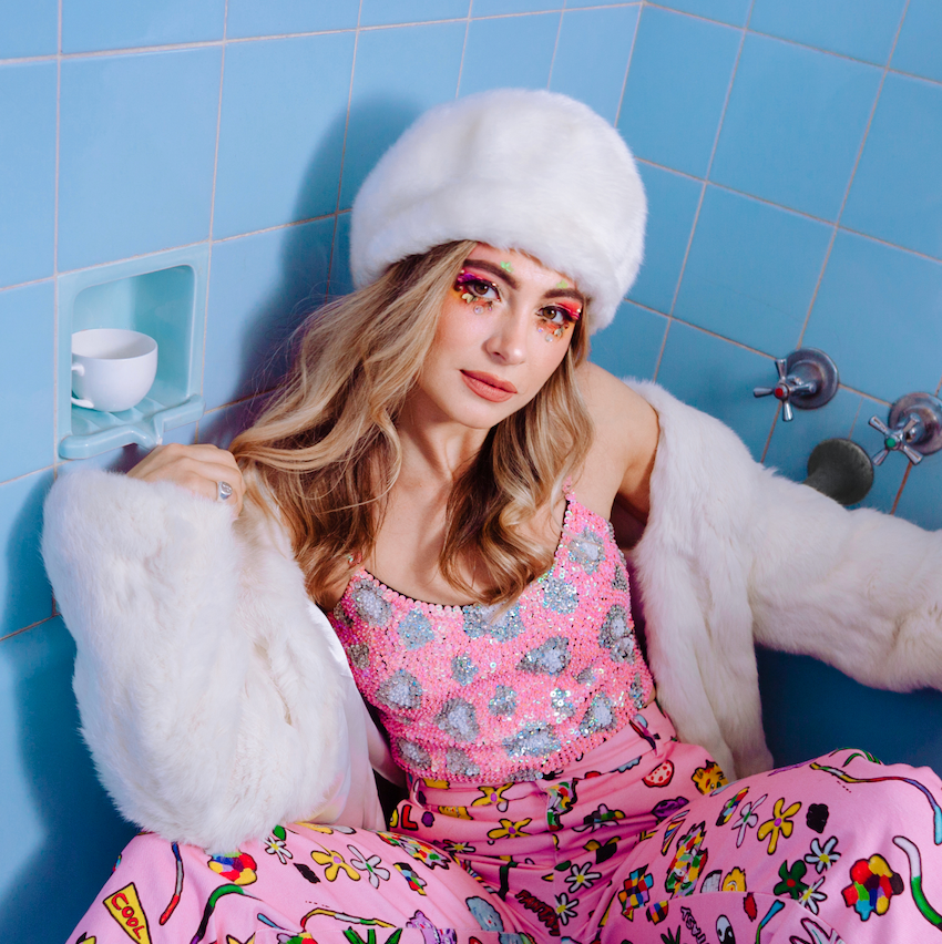 pink leopard print crop top, sequin crop top, pink sequin festival top, festival fashion, festival girl, blue bath tub, model in the bath, pink outfit, pink fashion, festival makeup.
