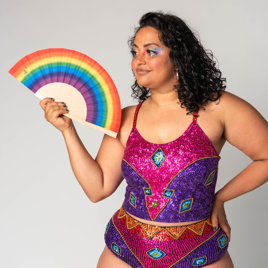 rainbow design hand fan for using at a festival, gay pride or rave Australia.