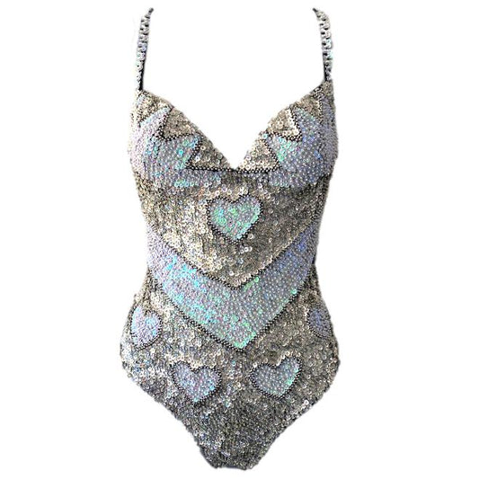 Handmade white and silver sequin one-piece bodysuit with love heart design. Perfect for bridal theme hens party outfits, disco hen party, Henchella, and festival theme bachelorette parties. Stylish, sparkly hens outfit for standout fashion.