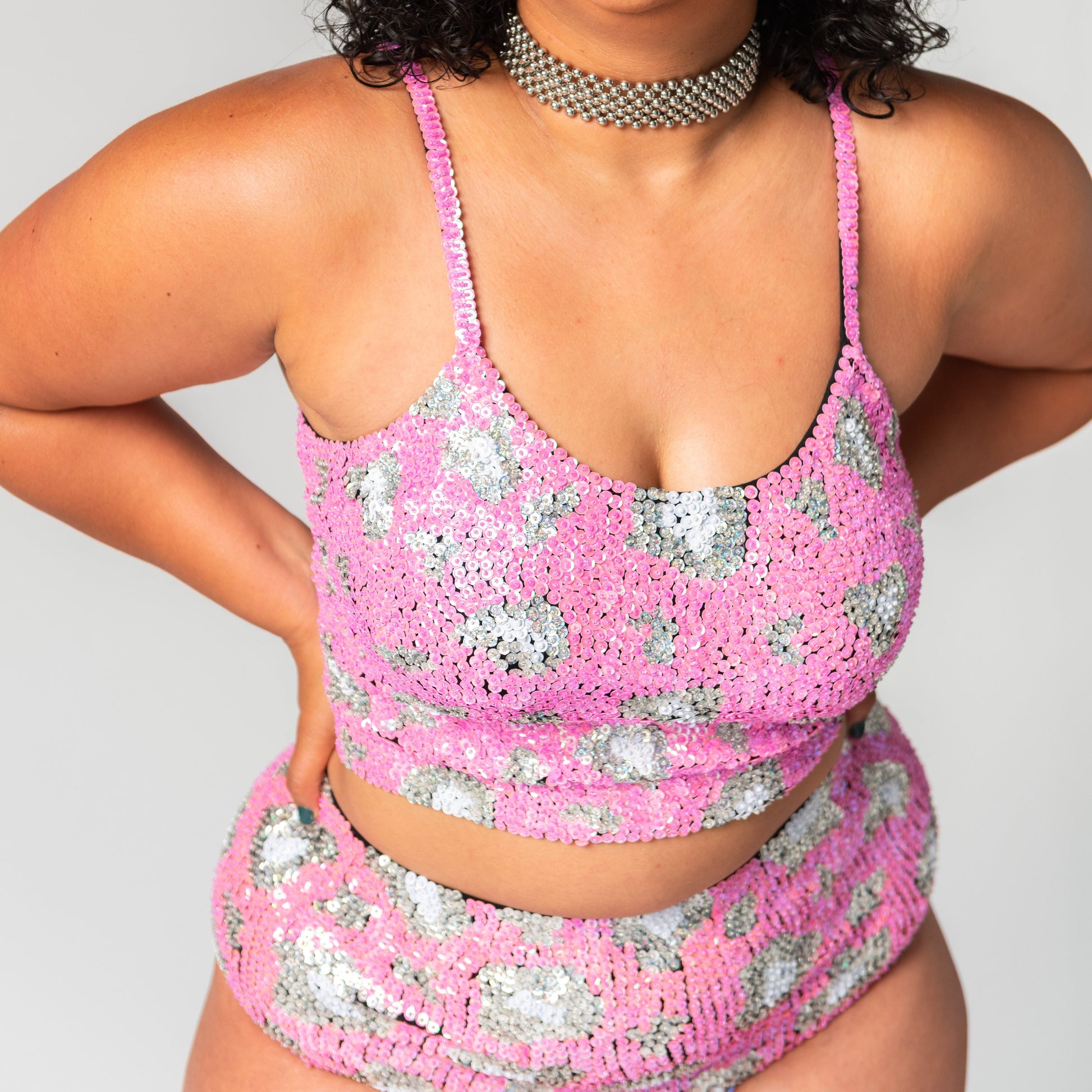 matching pink leopard print sequin festival top and high waist hot pants for festival outfits and Coachella.