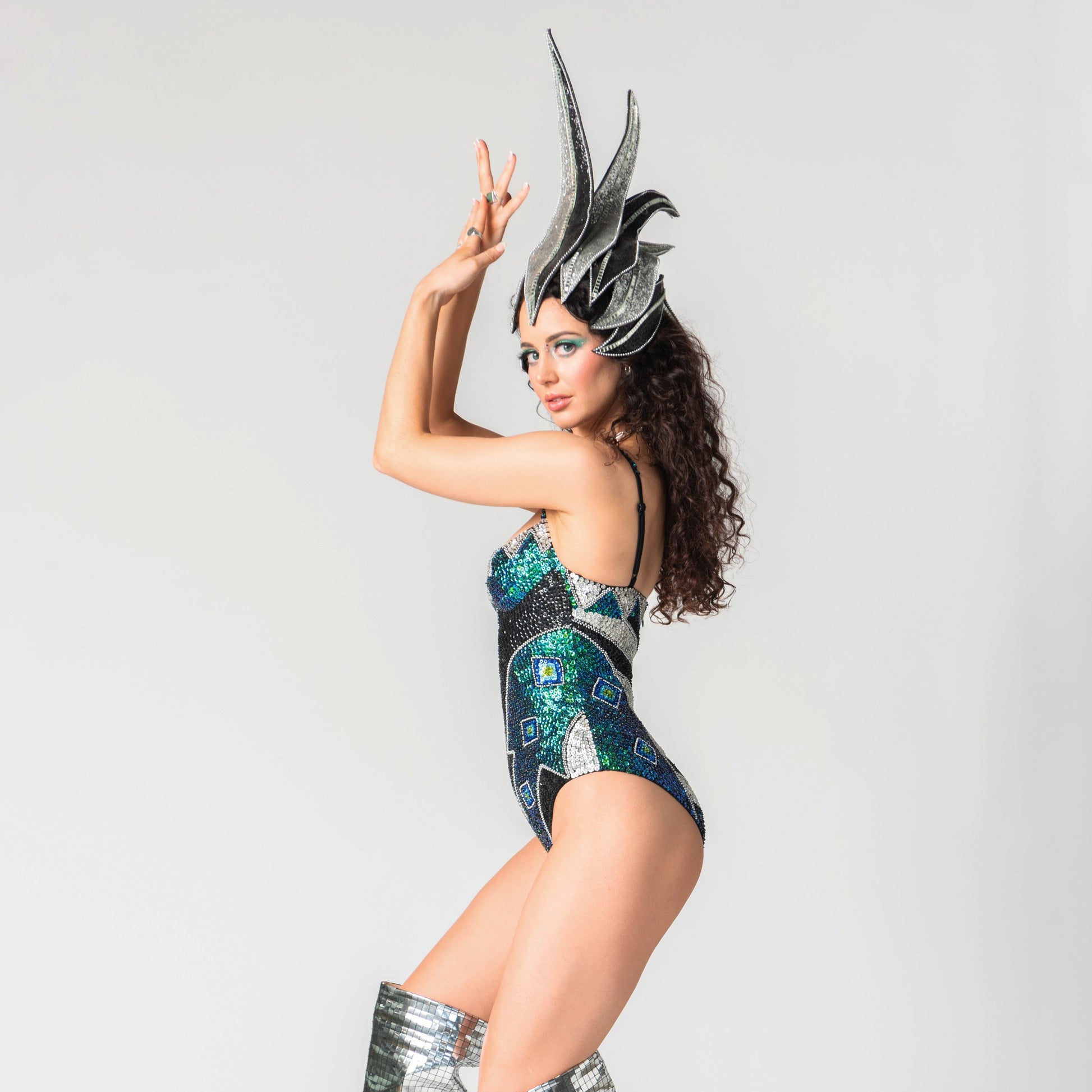 festival outfit with handmade sequin bodysuit, side view.