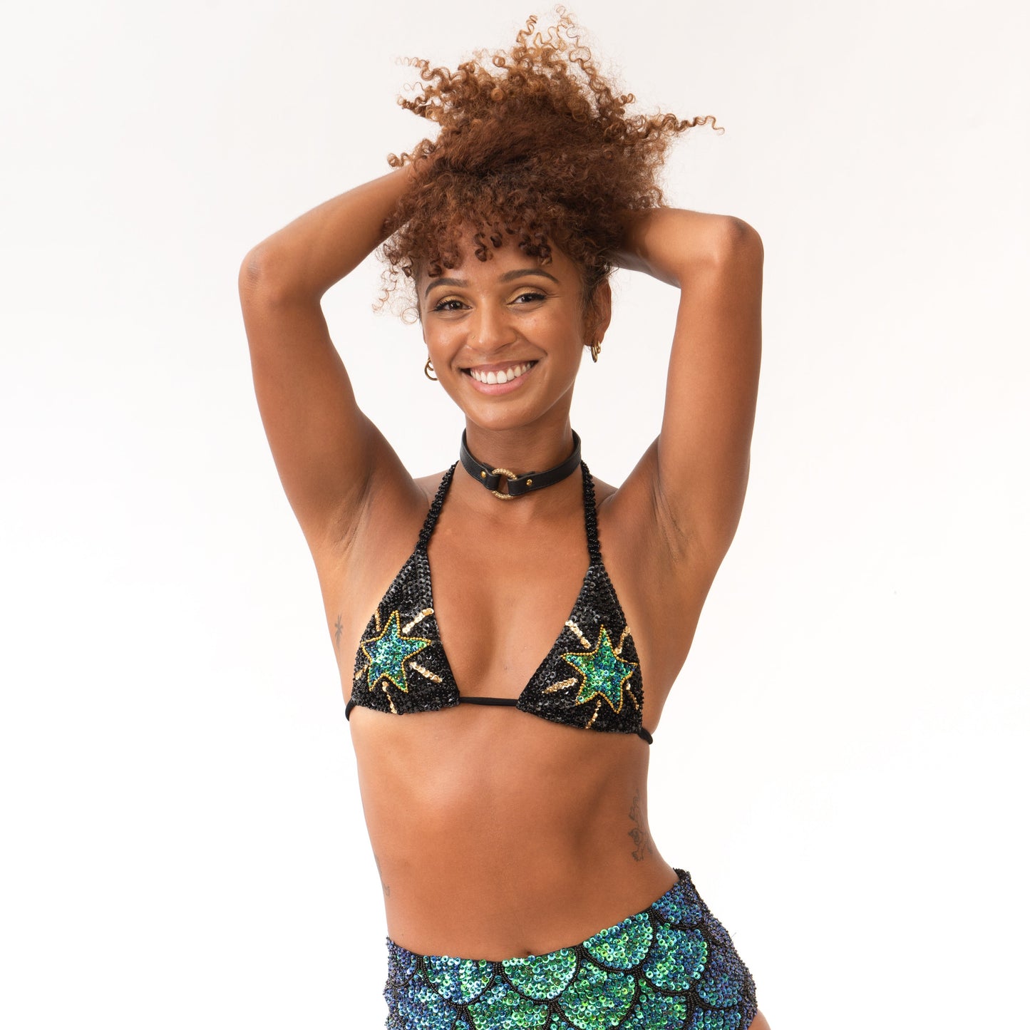matching sequin outfit with mermaid green sequins in triangle crop top and hot pants bottoms for burning man women's fashion