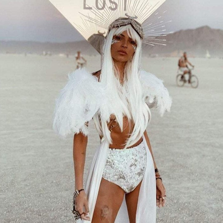 Our favourite Burning Man festival sequin hot pants. Made from pearl white and silver sequins, stretch cotton fabric and hand sequinned with love, festival fashion, burner girl, burner fashion, burning man fashion, festival wear, rave wear, white sequin shorts, festival outfits