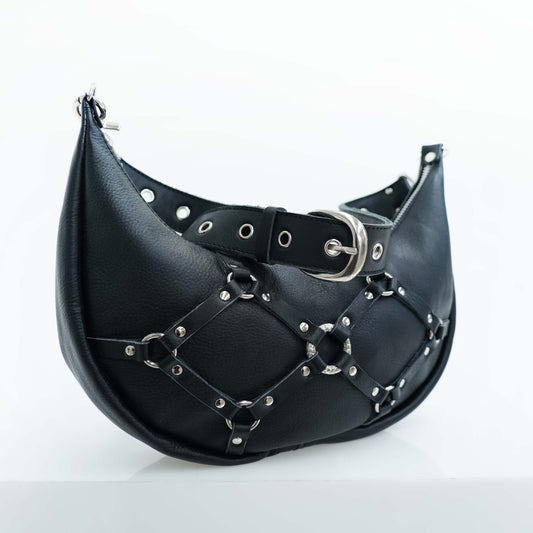 grunge style leather bag to wear to burning man festival or as a daring alt fashion handbag