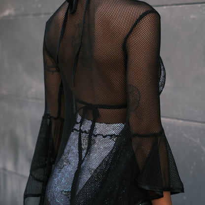 Stylish fishnet kimono in a soft, comfortable, and bouncy material. Adds a sexy and edgy layer to your alt fashion and festival outfits.