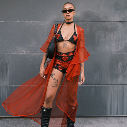 Eye-catching red mesh kimono ideal for Lollapalooza and Burning Man. Complements your festival outfit with its stylish and versatile design.