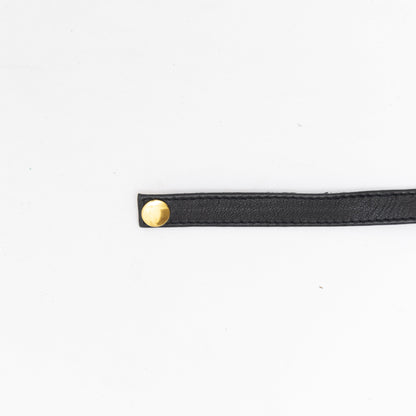 button closure on black leather chunky handmade choker. 