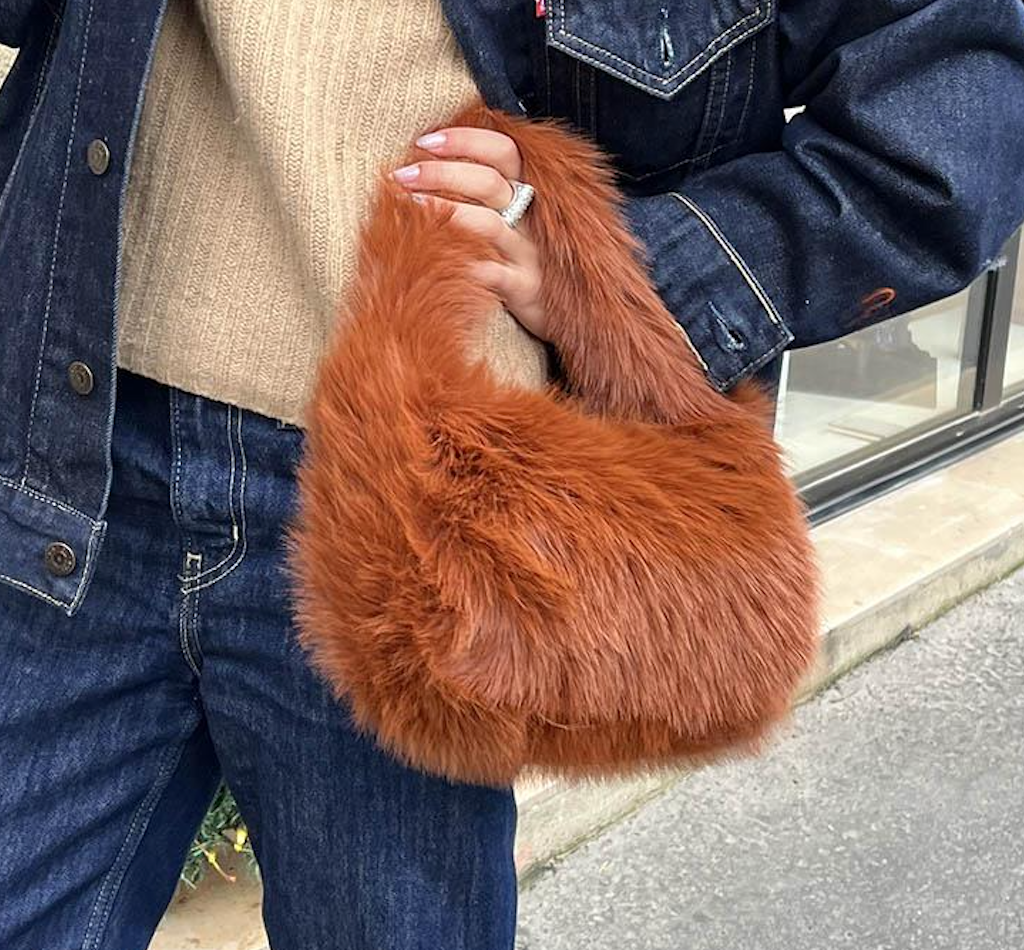 Brown faux fur handbag with a plush, fluffy texture, ideal for festival fashion and wedding styles