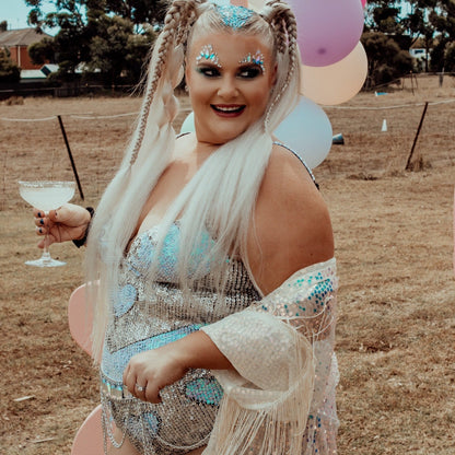 Handmade one-piece bodysuit featuring white and silver sequins with love heart design. Perfect for bridal theme festival theme bachelorette parties, disco hen party, Henchella, hens party outfit ideas, and Taylor Swift concert looks. Stylish, sparkly hens outfit and comfortable for plus size.