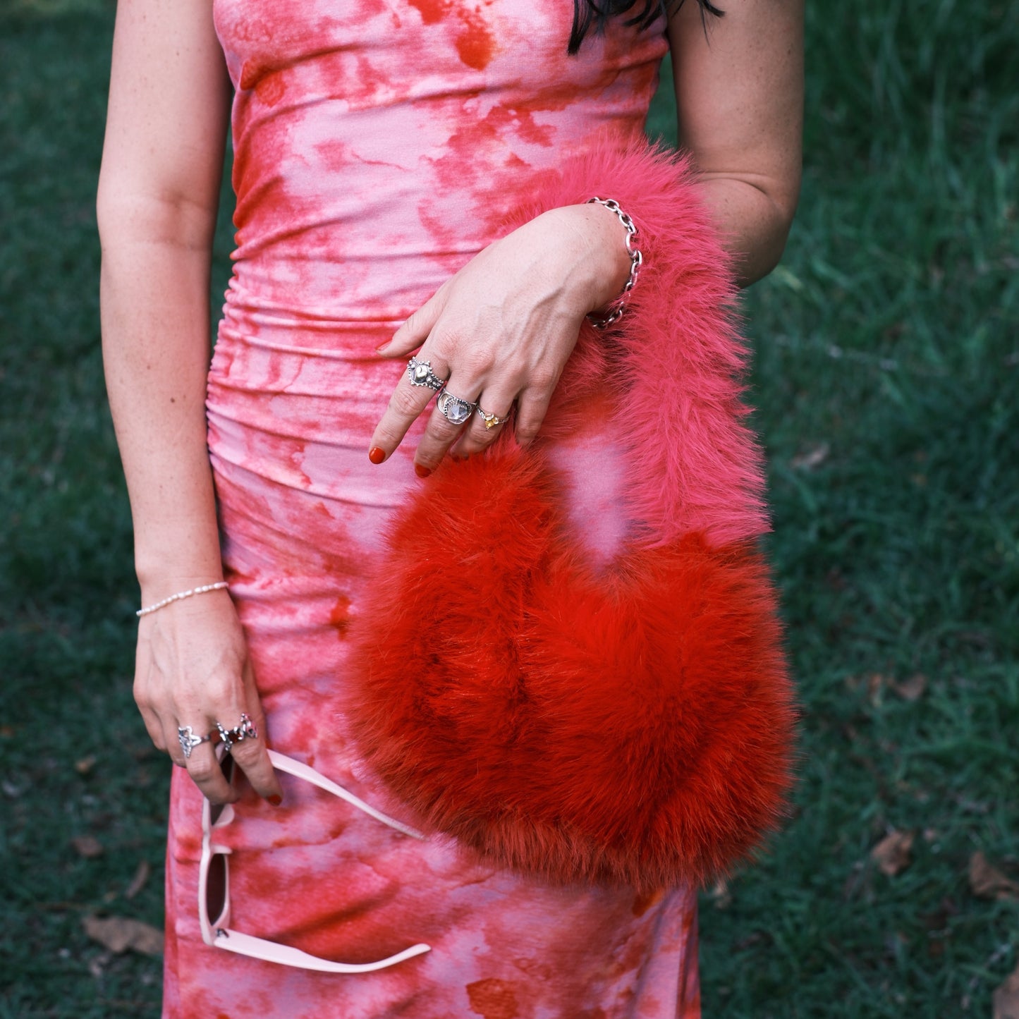 Funky red and pink faux fur handbag, perfect for weddings and festival fashion lovers