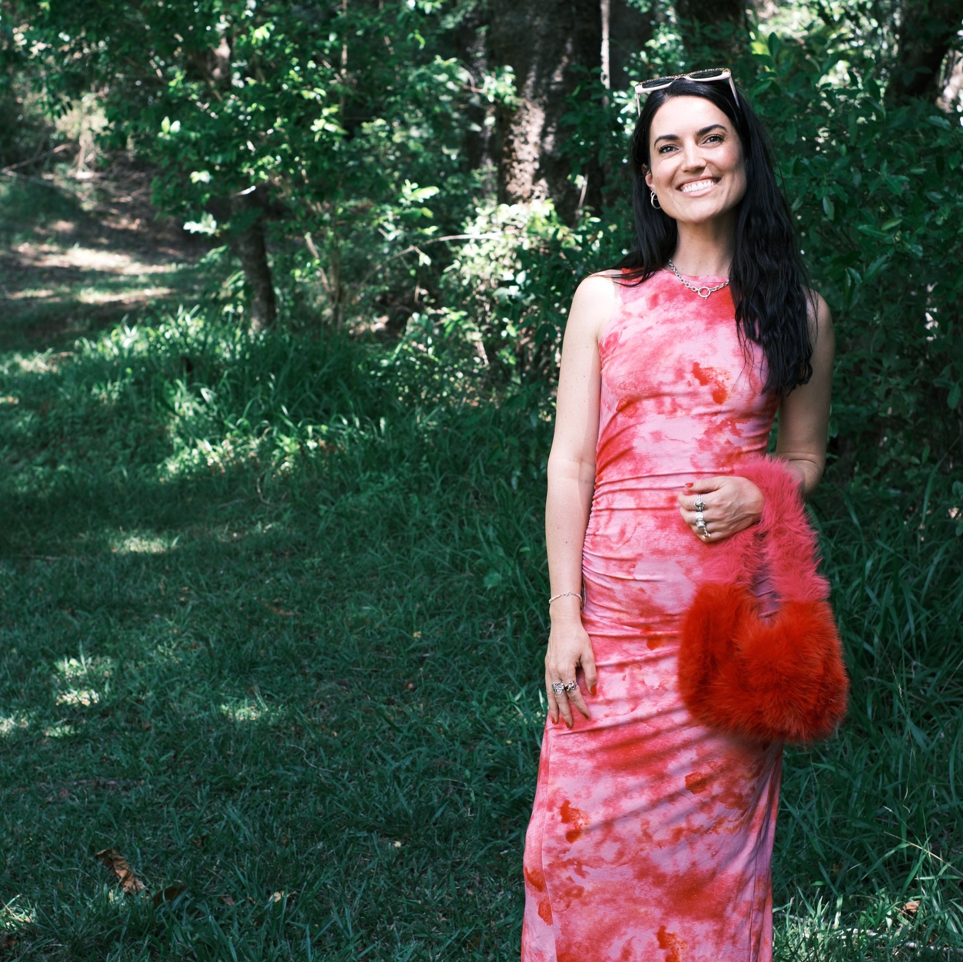 Statement faux fur handbag in vibrant red and pink, the ultimate funky accessory for festivals or weddings