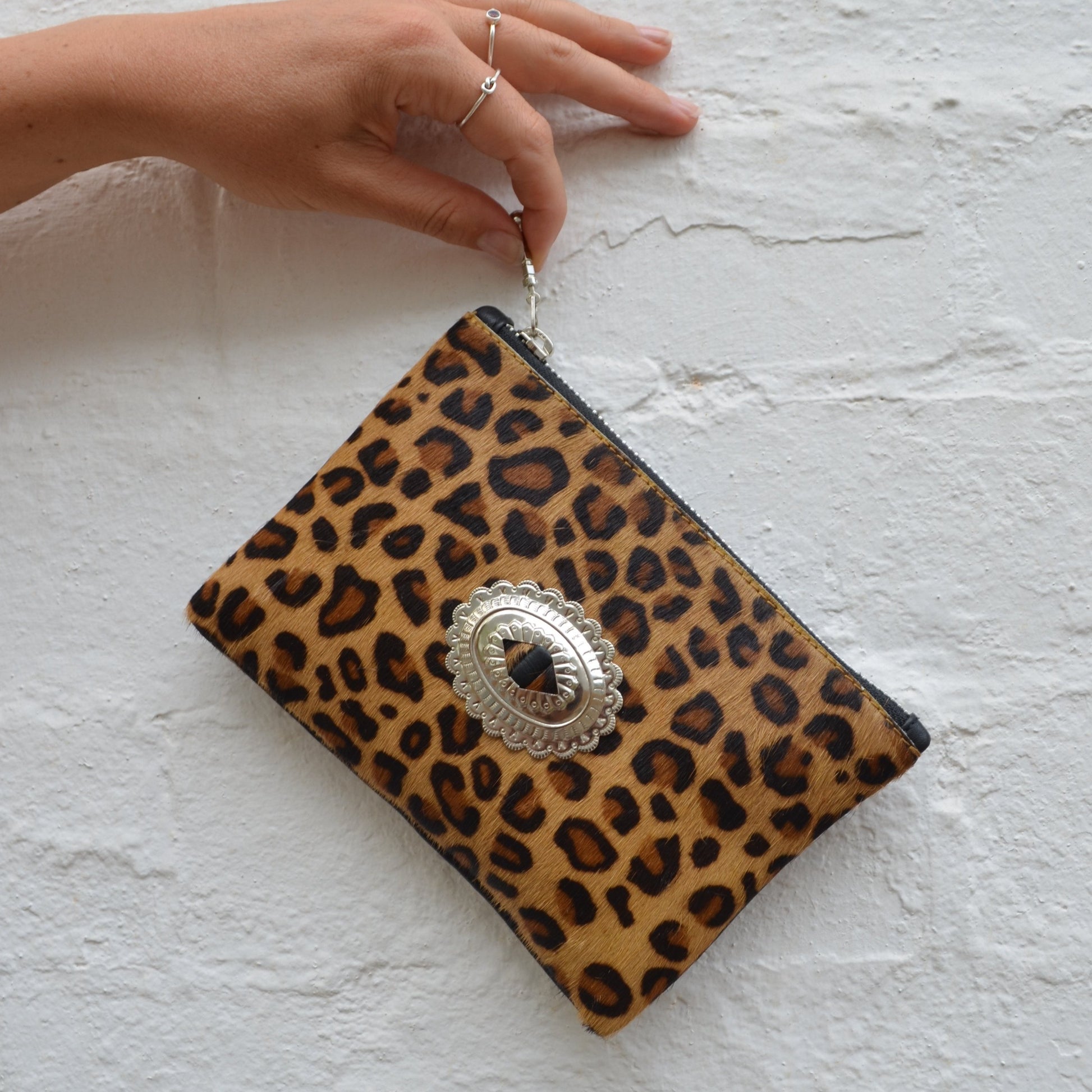 genuine leather leopard print ladies purse, small, feminine, petite, light, functional, perfect, cow hide, concho, silver hardware.