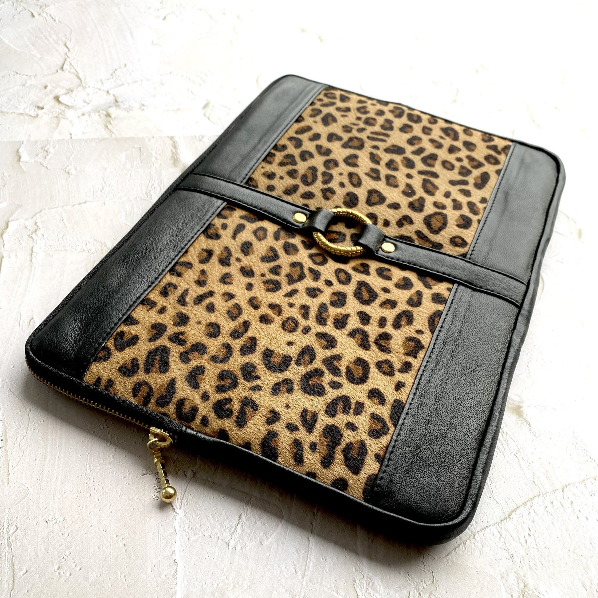 Leopard print genuine leather laptop bag, laptop case with gold hardware, zip closure, microfibre lining, feminine, slender.