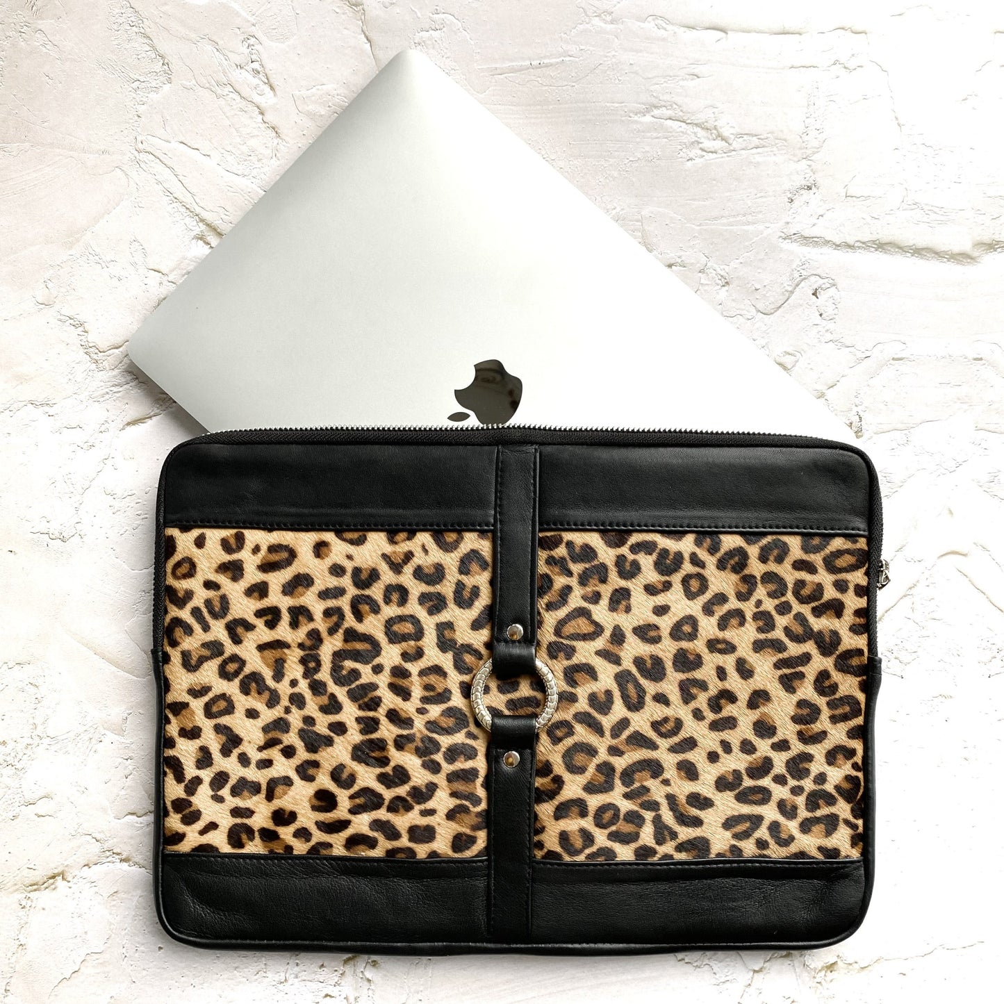 Hand made leather laptop bag with painted leopard print cow hide and silver details, silver hardware, zip closure, microfibre lining, zip pocket, feminine, slender, designer, animal print, apple, macbook, 13 inch, macbook air. 