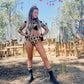 burning man festival outfit, burner girl, burning man fashion, festival wear, festival model with black harness top, leopard print sequin hot pants gold and festival boots, doof boots, braids, goddess, holster bag, mad max theme, festival fashion, festival hair, rave wear, rave outfit, rave hairstyle. 