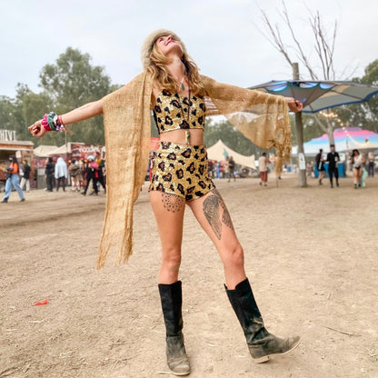 all you need is faith and trust and a little pixie dust, festival fairy, gold costume, leopard print, sequin matching set, strawberry fields festival, expression, dancing, joy, freedom, festival fashion, rave wear, rave girl.