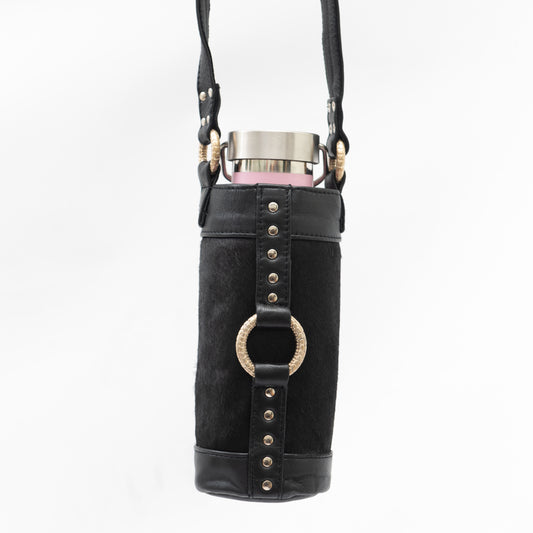 designer cross body water bottle bag made from black leather and silver accessories for festival 