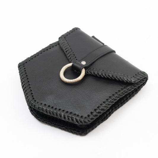 handmade black leather belt bag for festival outfit with detachable belt, luxe silver ring on the front and zip pocket inside. 