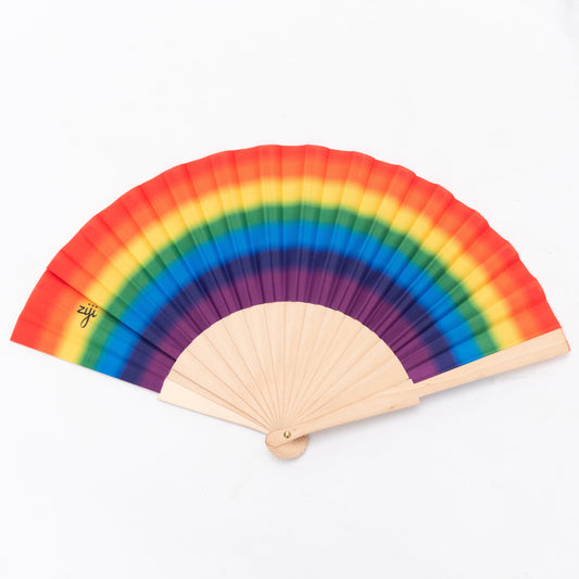 rainbow festival hand fan made with printed fabric and a wooden frame for rave Australia or gay pride. 