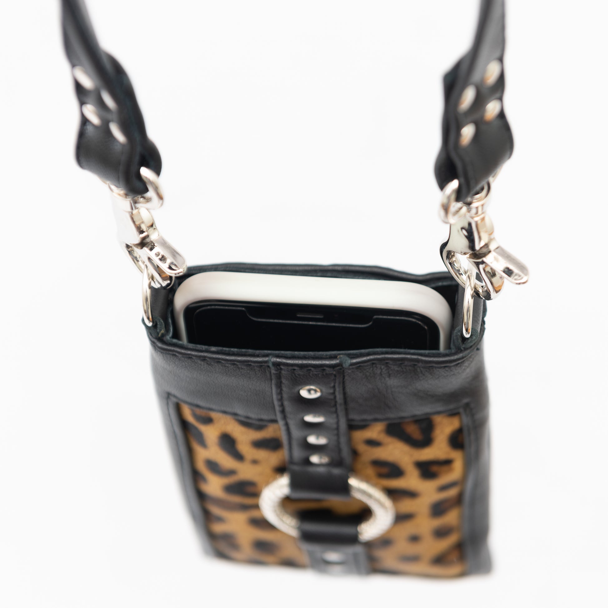 leopard print crossbody mobile phone holster bag with adjustable shoulder strap and leopard print cow hide, hand made designer iPhone pouch.  