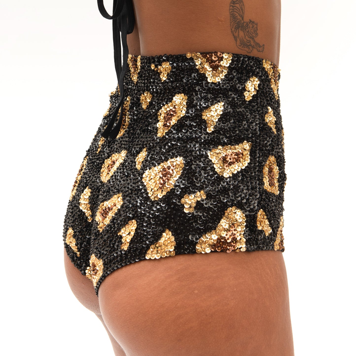 hand made sequin shorts in gold and black leopard print design for festival outfits