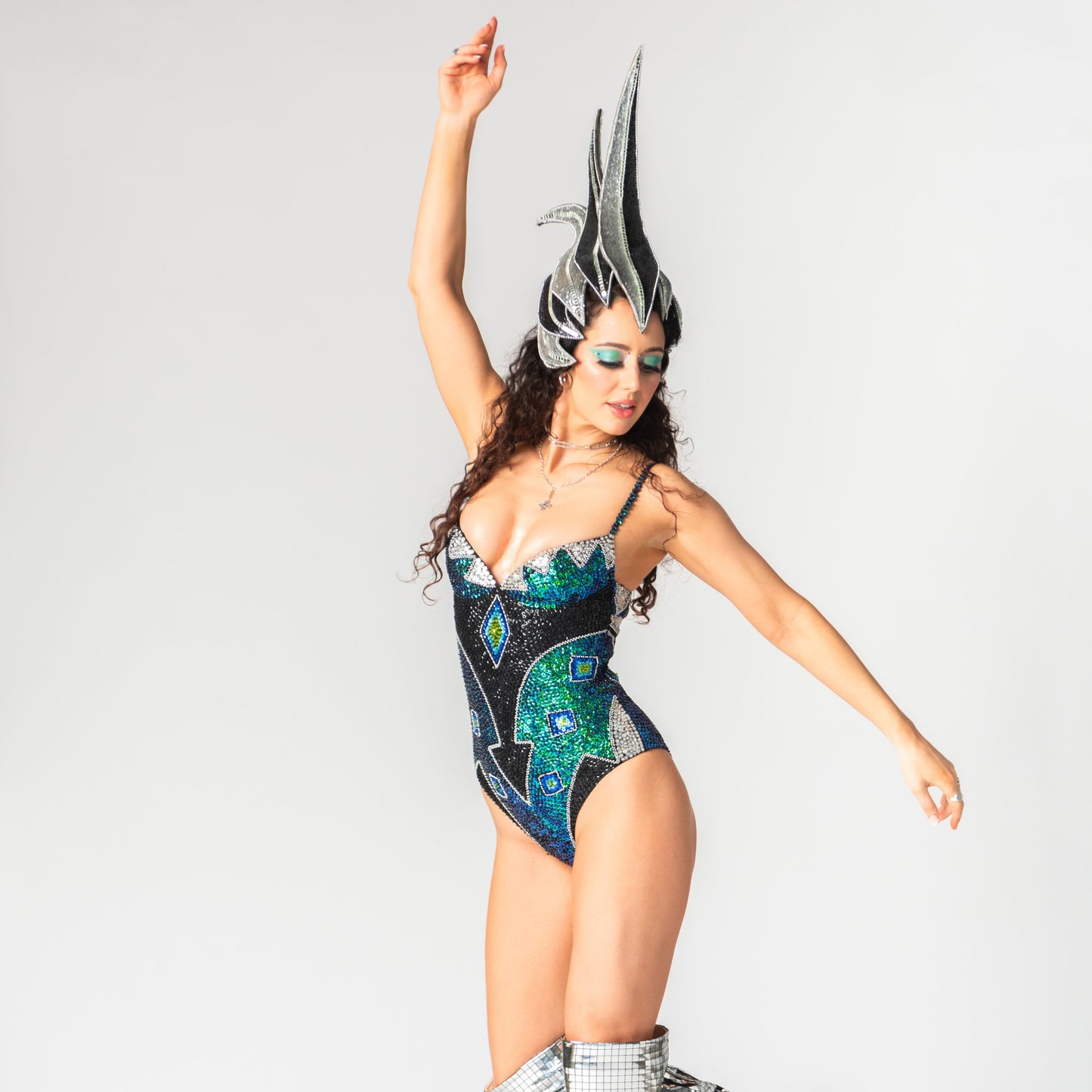 performance costume made from green, black, silver and blue sequins