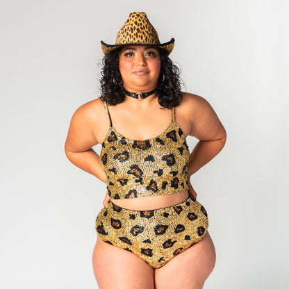 matching gold leopard print sequin crop top and high waist bottoms for festival outfits and rave wear for burning man. 