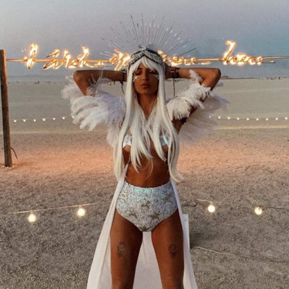 Handmade sequin high waist festival shorts in white and silver with star design for burning man festival. Perfect for bridal party outfits, hens party looks, hen do outfits, hen party costumes, Henchella, and Taylor Swift concert fashion. Stylish, chic, sparkly hens hot pants and comfortable festival fashion.