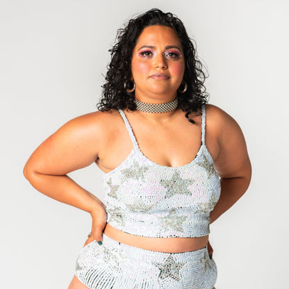 Handmade sequin crop top in white and silver with star design. Perfect for festival outfits, bridal party looks, hen do outfits, Henchella, and Taylor Swift concert fashion. Stylish, chic, sparkly hens top for a standout appearance.
